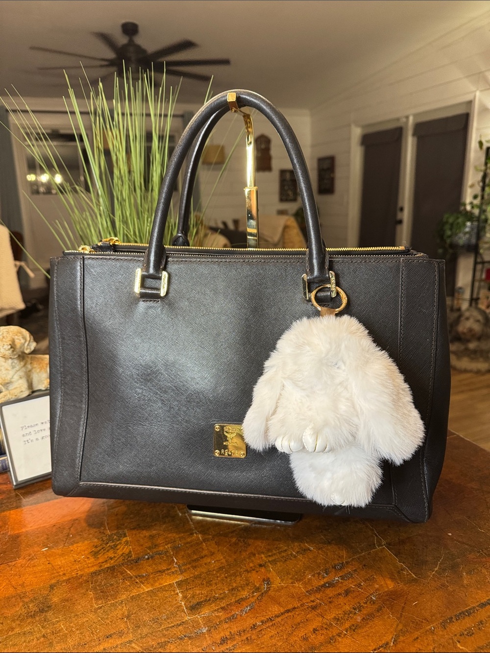 MCM Black Satchel with Ivory Fur Charm